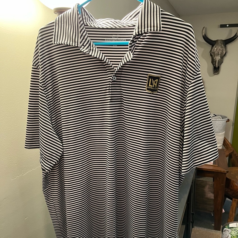 Vineyard Vines golf polo. Under armor material